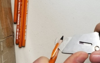 Shaving off a Pencil's Wooden Barrel