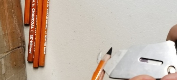 Shaving off a Pencil's Wooden Barrel